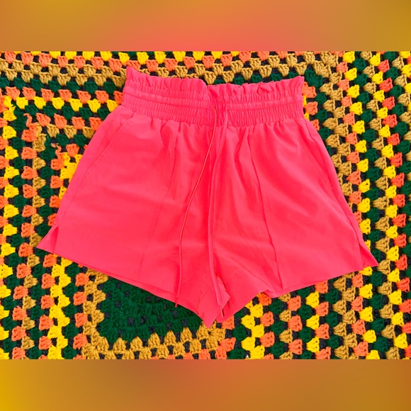 orange shorts - Picture 1 of 3